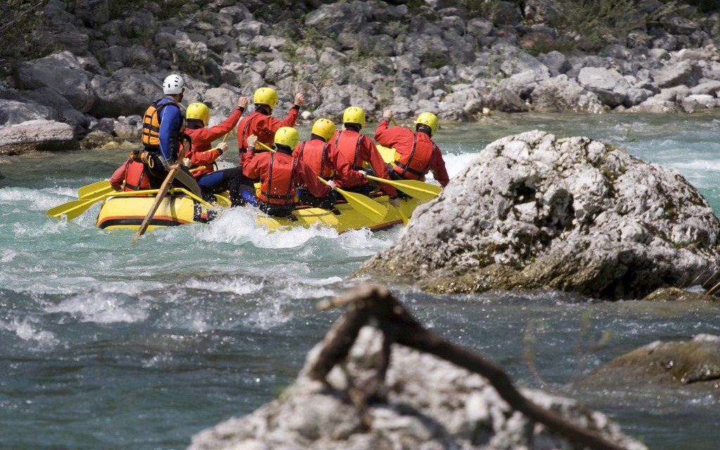 White water rafting guide with clients White water rafting guide with clients